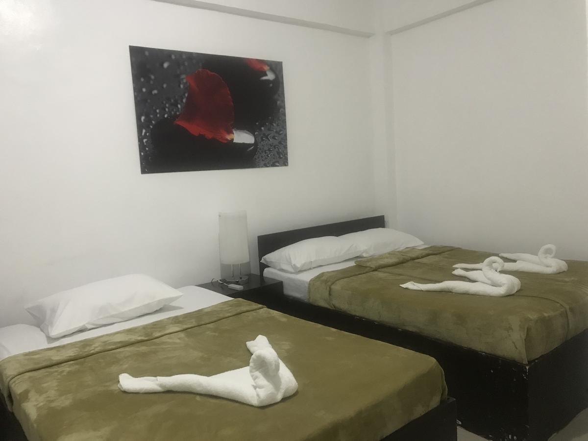 4C'S Tourist Lodge بويرتو برينسيسا المظهر الخارجي الصورة