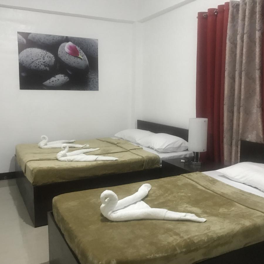 4C'S Tourist Lodge بويرتو برينسيسا المظهر الخارجي الصورة