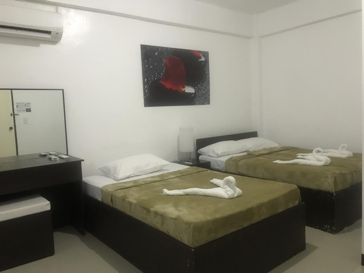 4C'S Tourist Lodge بويرتو برينسيسا المظهر الخارجي الصورة
