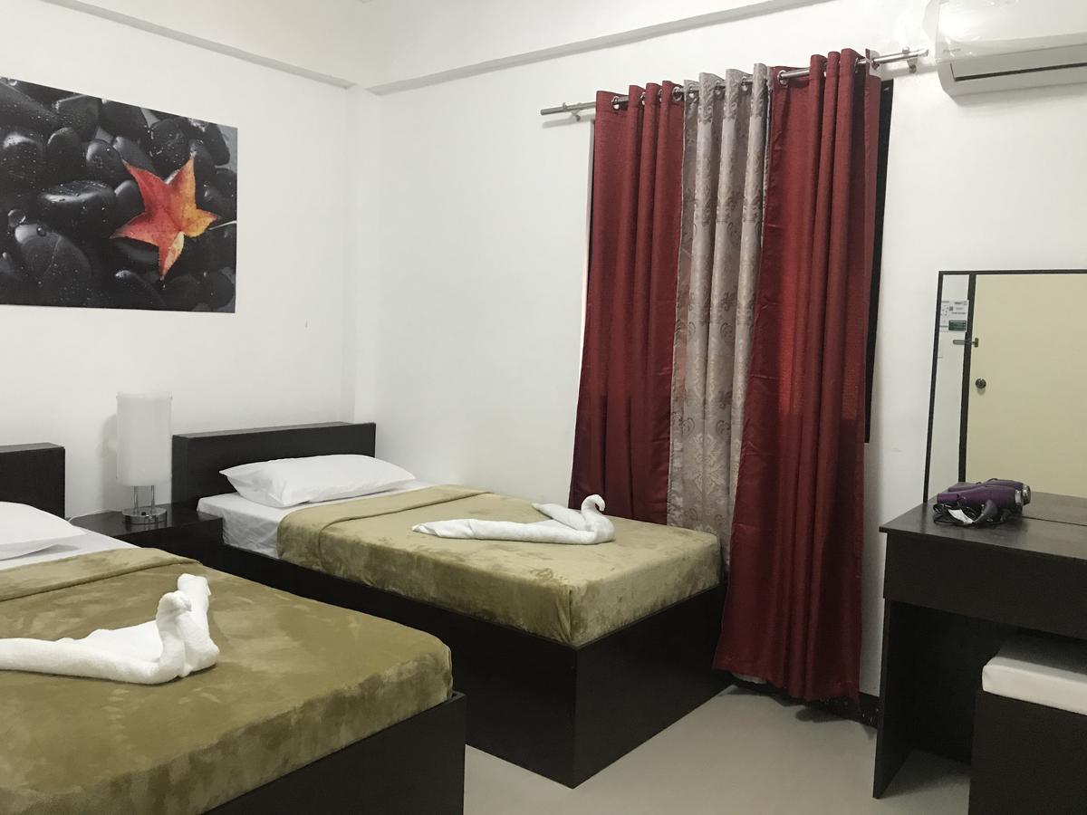 4C'S Tourist Lodge بويرتو برينسيسا المظهر الخارجي الصورة