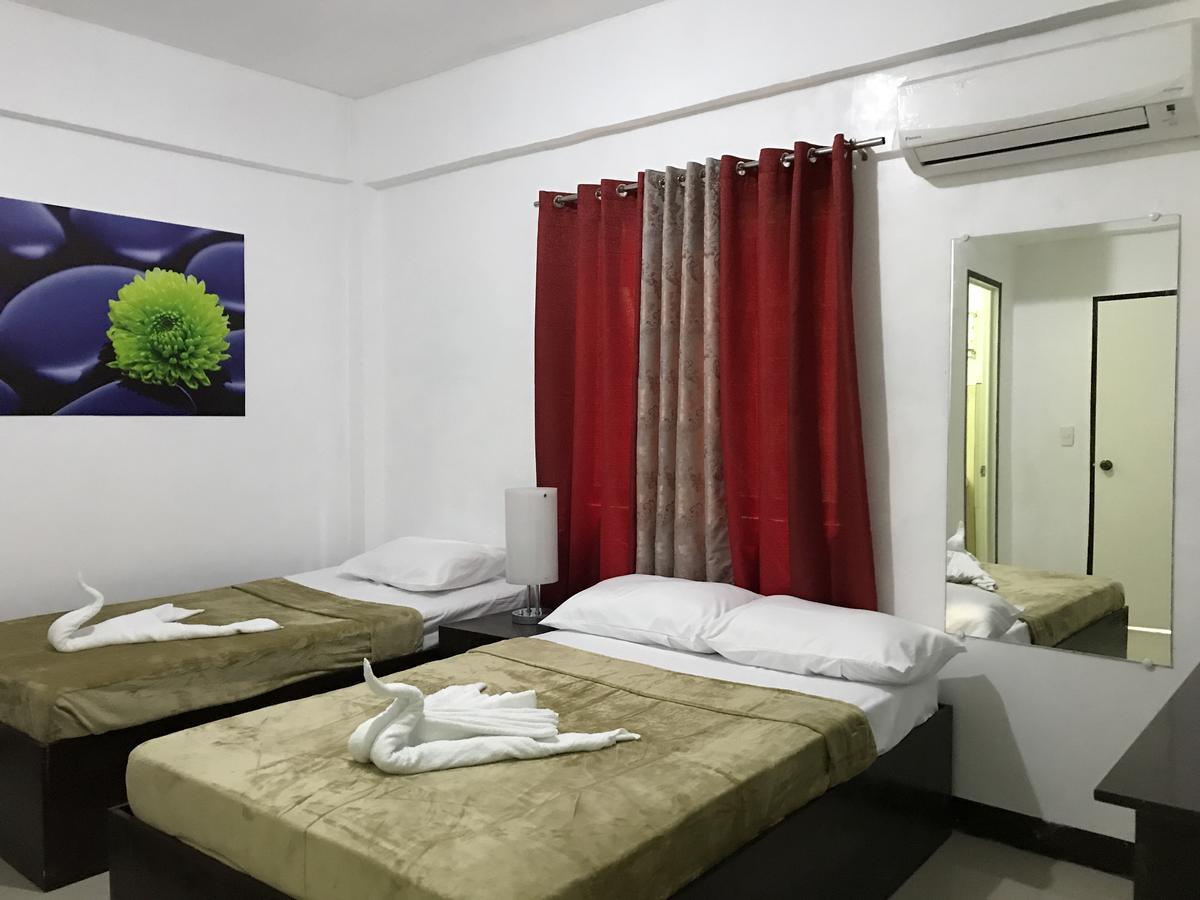 4C'S Tourist Lodge بويرتو برينسيسا المظهر الخارجي الصورة