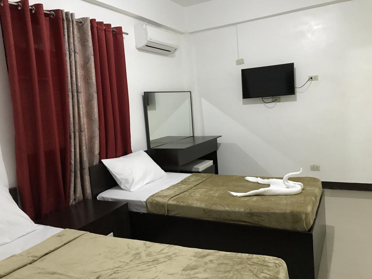4C'S Tourist Lodge بويرتو برينسيسا المظهر الخارجي الصورة