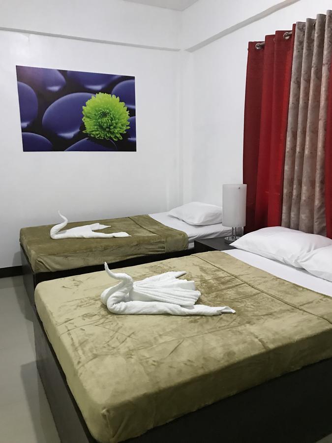 4C'S Tourist Lodge بويرتو برينسيسا المظهر الخارجي الصورة