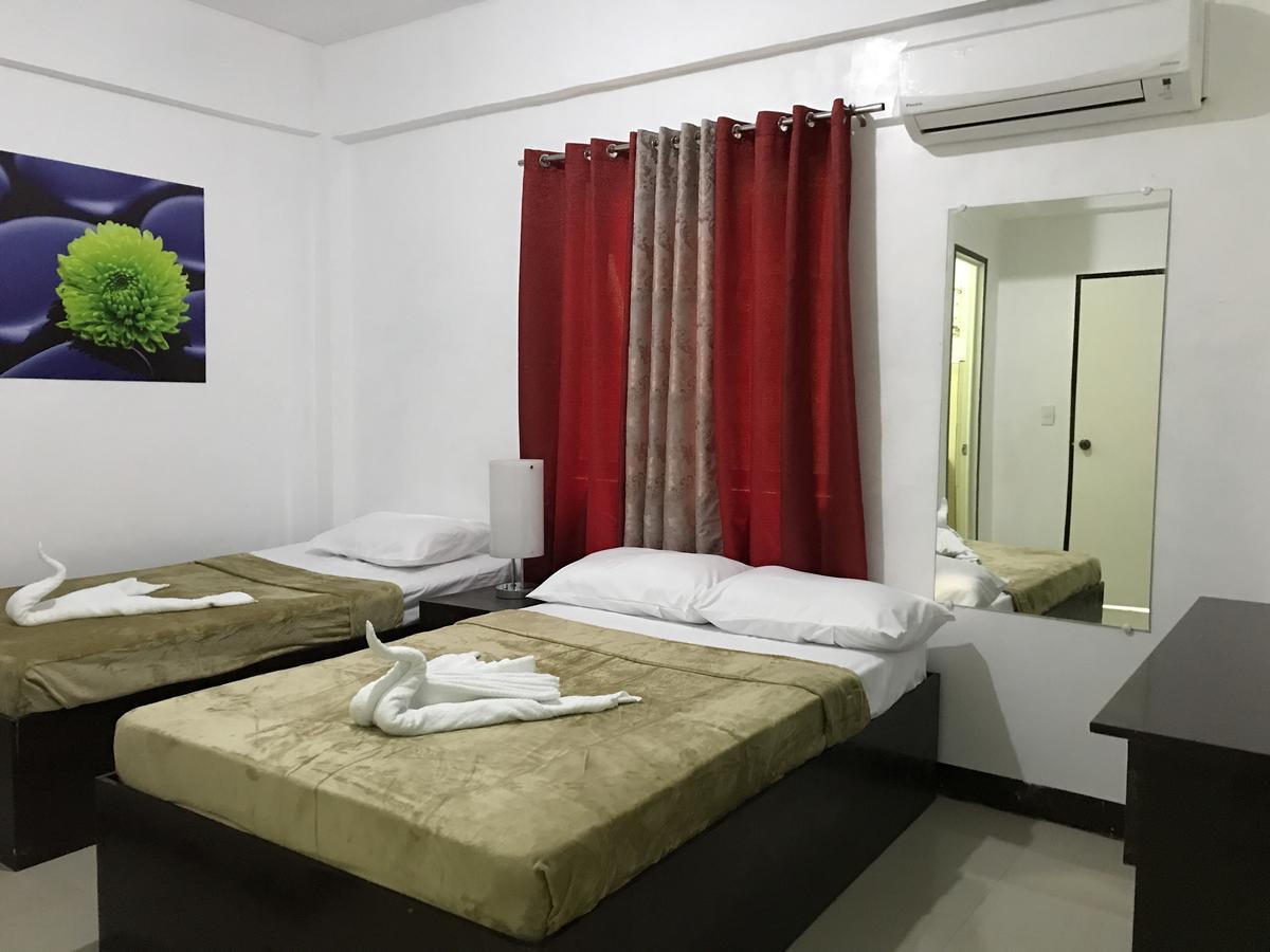 4C'S Tourist Lodge بويرتو برينسيسا المظهر الخارجي الصورة