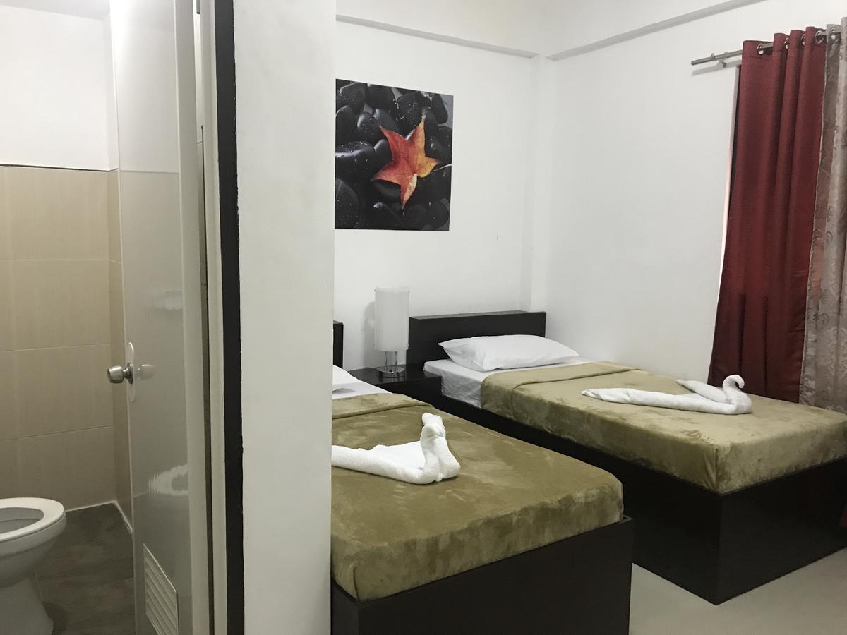 4C'S Tourist Lodge بويرتو برينسيسا المظهر الخارجي الصورة