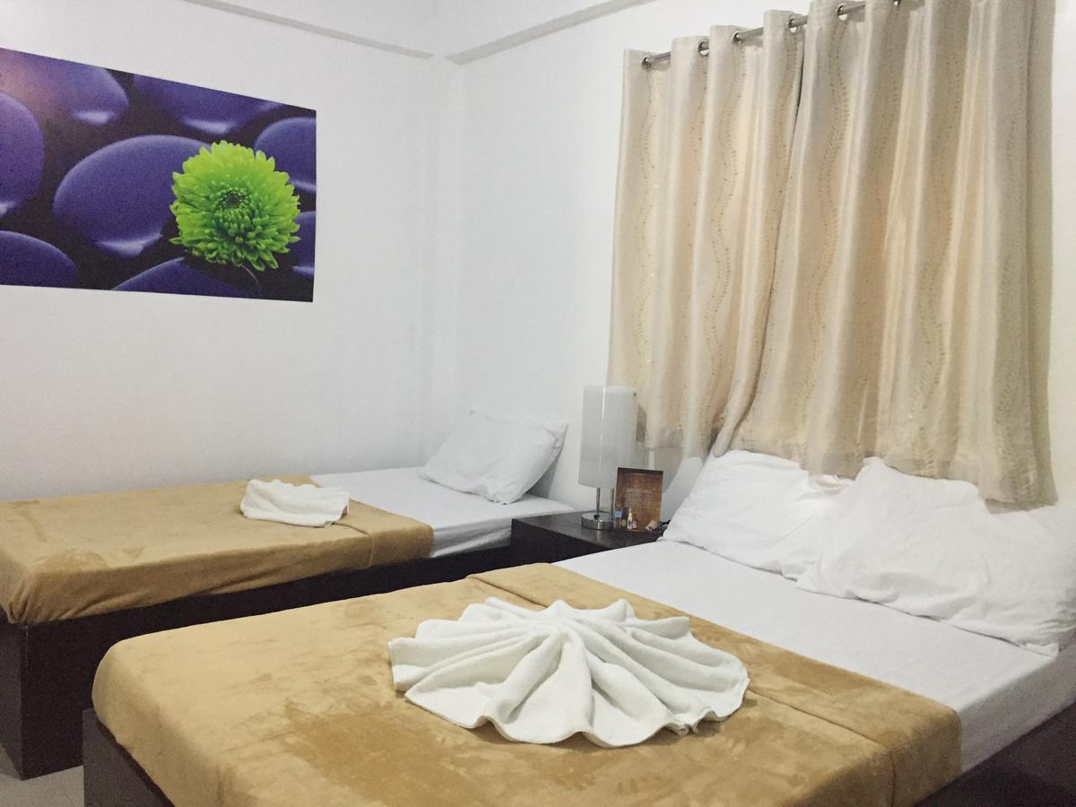 4C'S Tourist Lodge بويرتو برينسيسا المظهر الخارجي الصورة