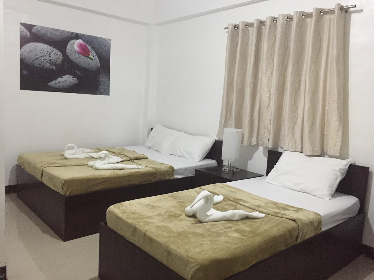 4C'S Tourist Lodge بويرتو برينسيسا المظهر الخارجي الصورة