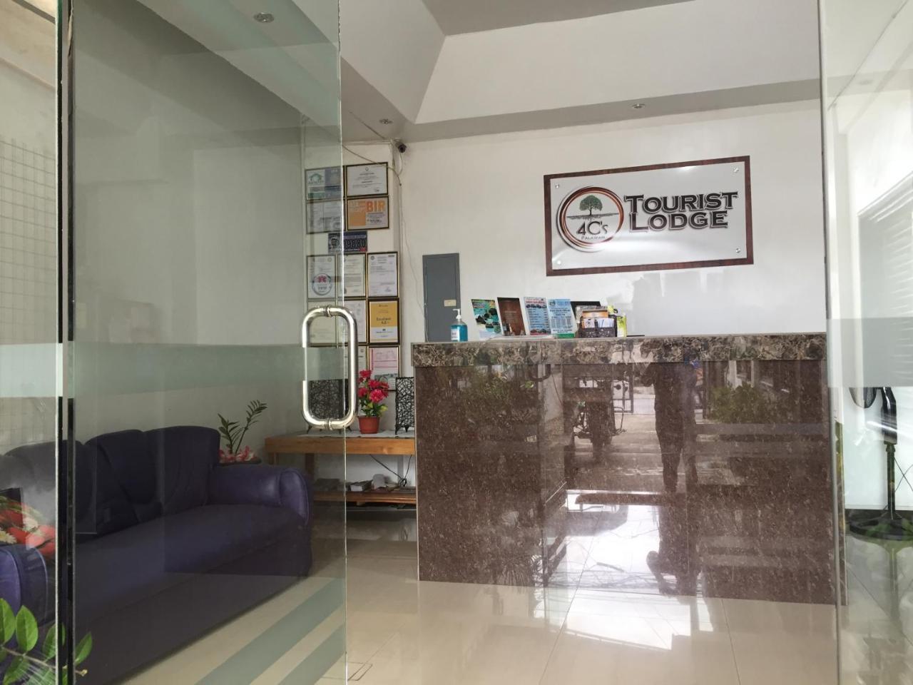 4C'S Tourist Lodge بويرتو برينسيسا المظهر الخارجي الصورة